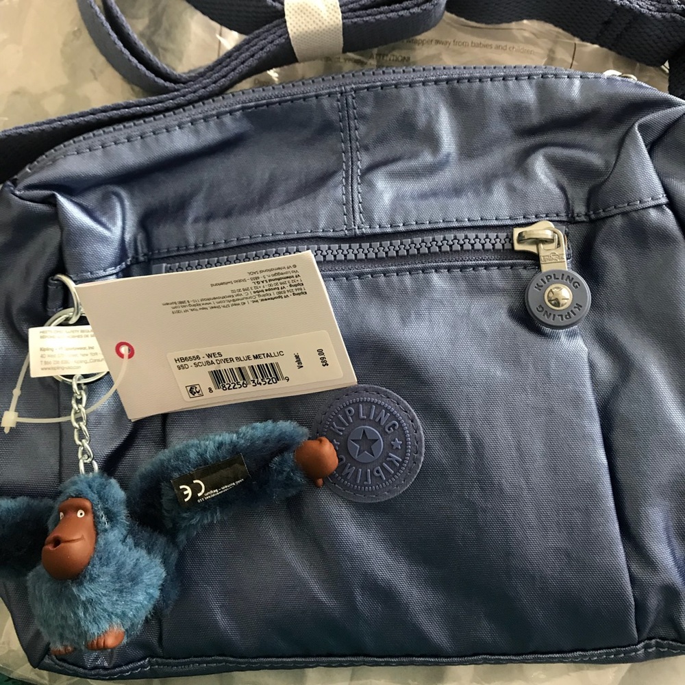 Metallic blue kipling bag